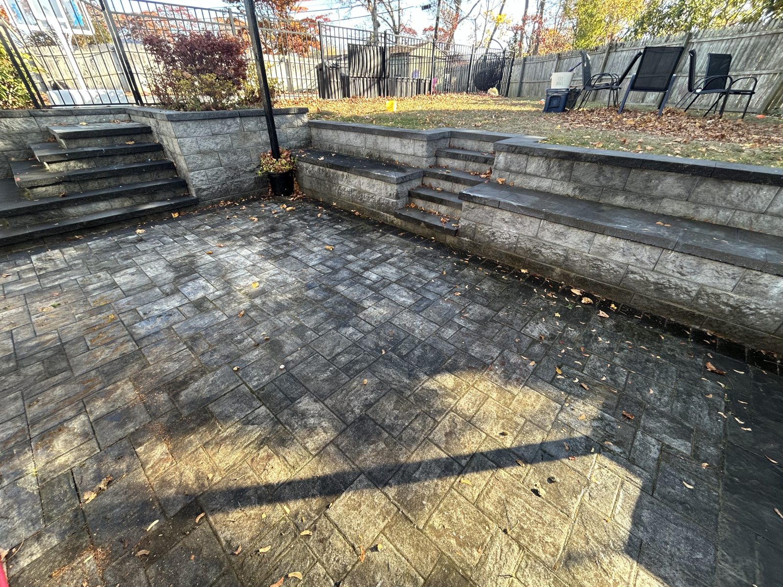 Dirty stamped paver patio before cleaning