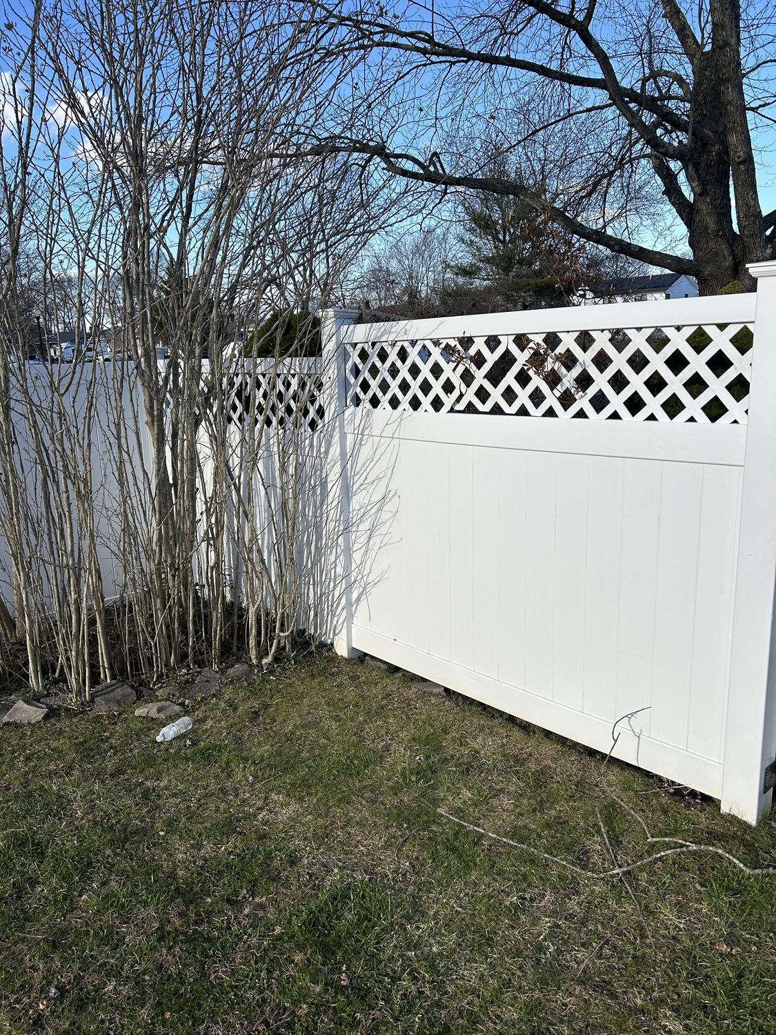White vinyl fence after soft washing